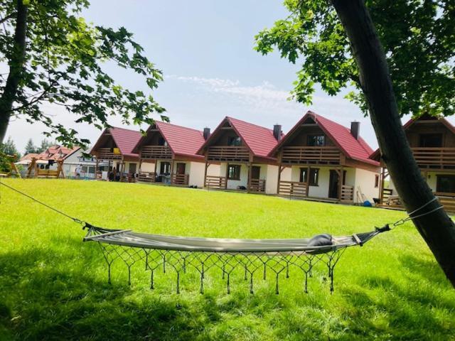 Kalinowy Sad Domki Z Jacuzzi I Sauna Mikołajki Bagian luar foto