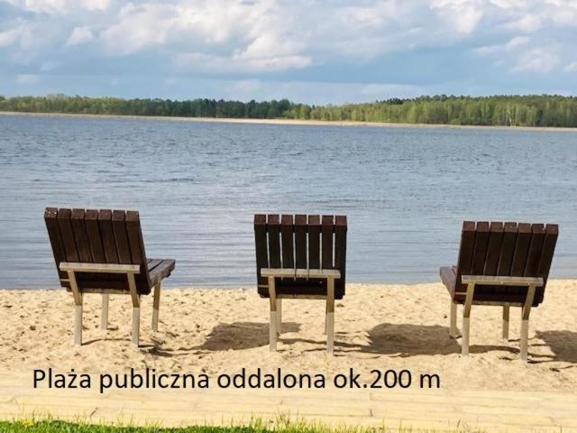 Kalinowy Sad Domki Z Jacuzzi I Sauna Mikołajki Bagian luar foto